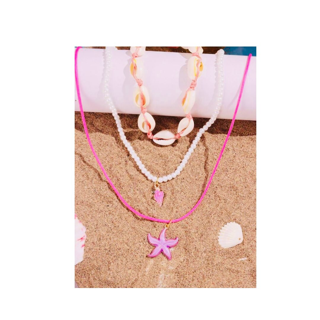 Conjunto de 3 piezas .Collar con un colgante de estrella de mar color rosado 🩷🩷🩷🩷🩷